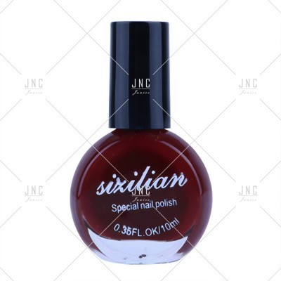 frasco de esmalte de unhas vermelho escuro com tampa preta