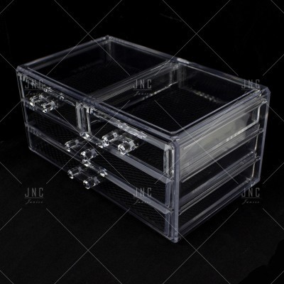 Estojo organizador transparente em acrílico com três gavetas e textura quadriculada