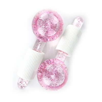 Dois rolos de massagem cor-de-rosa com glitter e pega branca