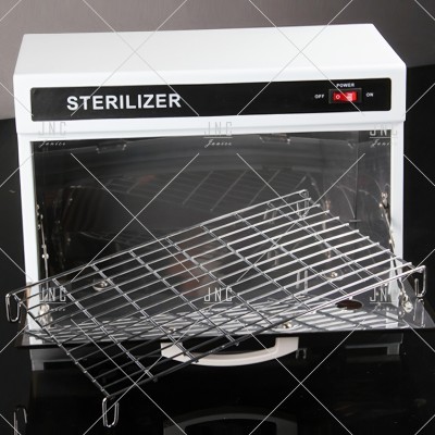 Esterilizador branco com porta de vidro e grade metálica aberta