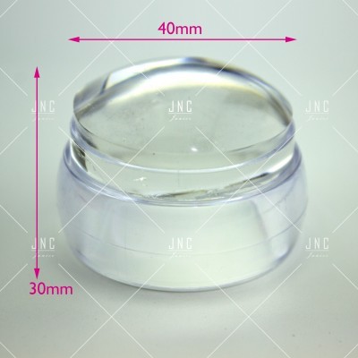 Objeto transparente arredondado com marcações de medida 40mm e 30mm