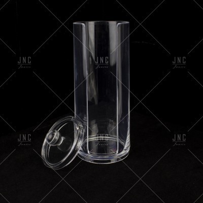 Recipiente cilíndrico transparente com tampa ao lado