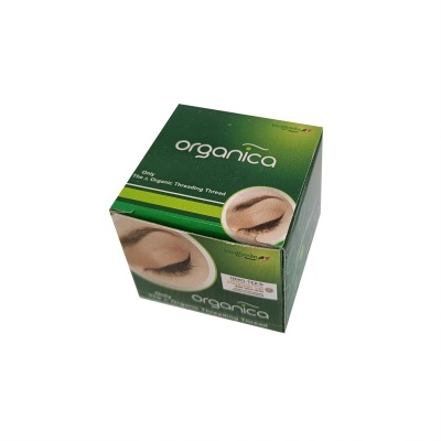 Embalagem verde do Organica com imagem de olho feminino e texto branco