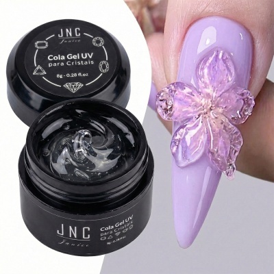 Cola Gel UV para Cristais JNC ao lado de unha decorada lilás com flor 3D