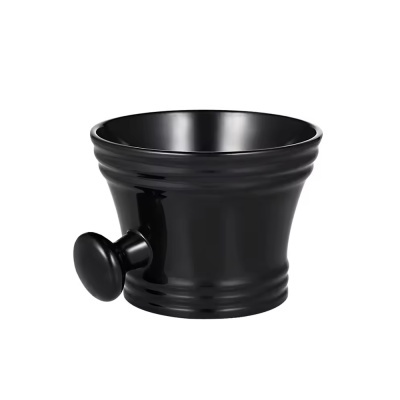 Recipiente preto em cerâmica com botão lateral