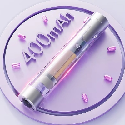 Dispositivo cilíndrico transparente com texto 400mAh e cápsulas roxas