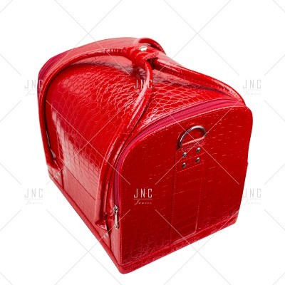 Mala de mão vermelha com textura de pele de crocodilo e alças vermelhas