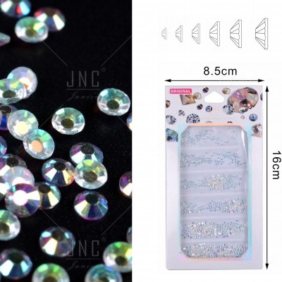 Cristais decorativos iridescentes com embalagem branca e dimensões indicadas