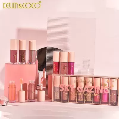 Conjunto de gloss labial em várias cores dentro de embalagem transparente rosa