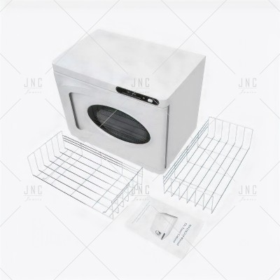 Máquina esterilizadora branca com visor oval preto e acessórios