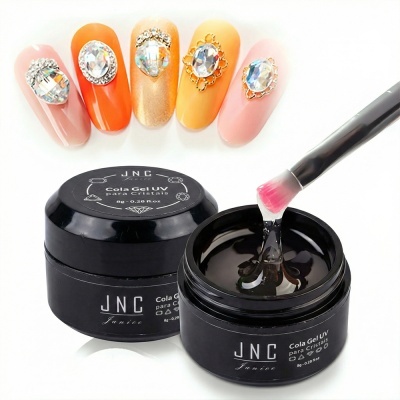 Cola Gel UV para Cristais JNC Janice com unhas decoradas e aplicadora