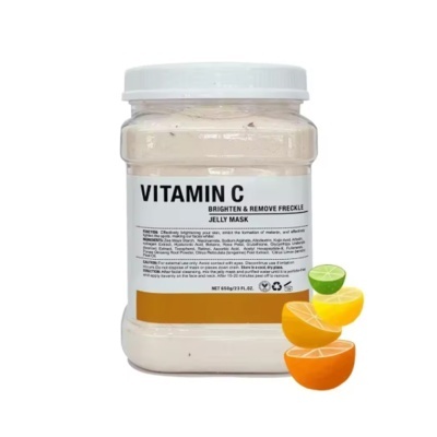 Frasco com máscara facial de vitamina C e frutas cítricas ao lado