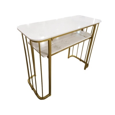 Mesa branca com padrão mármore e estrutura dourada