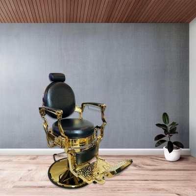 Cadeira de barbeiro vintage dourada com couro preto num ambiente interior
