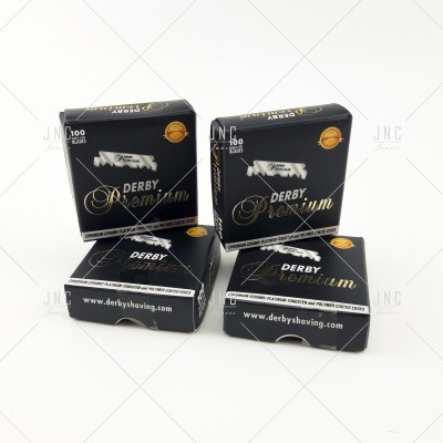 Caixas pretas de lâminas de barbear DERBY Premium com texto dourado e branco