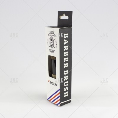 Caixa branca e preta de escova de barbear com detalhes azuis e vermelhos