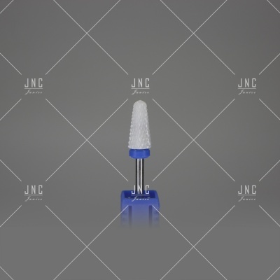 Broca de unha branca com base azul sobre fundo cinzento