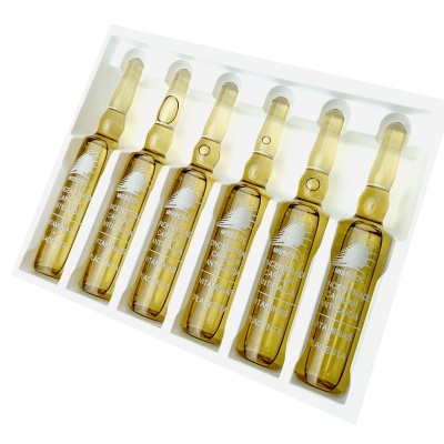 Seis ampolas de vidro âmbar com texto branco em embalagem plástica branca.