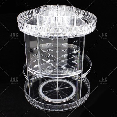 Expositor giratório transparente para maquilhagem em acrílico com texturas facetadas
