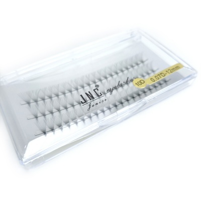 Caixa transparente com pestanas postiços agrupados