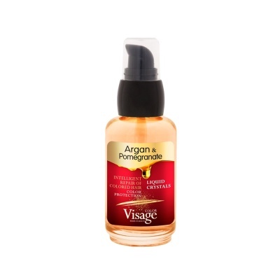 Frasco de vidro com líquido âmbar e rótulo vermelho e dourado de produto capilar Visage Color com tampa preta.
