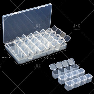 Caixa organizadora plástica transparente com compartimentos quadrados e tampas individuais.