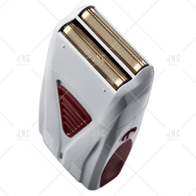 Aparelho de barbear elétrico branco com detalhes vermelhos e lâminas metálicas douradas