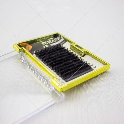 Caixa plástica com extensões de pestanas negras