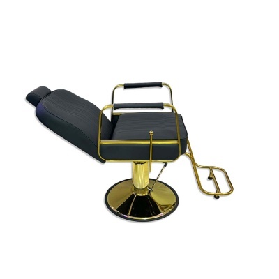 Cadeira reclinável preta de barbearia com estrutura dourada e suporte para pés