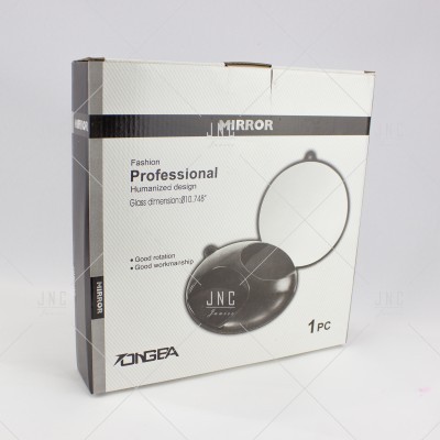 Caixa de espelho compacto redondo preto na embalagem branca e preta