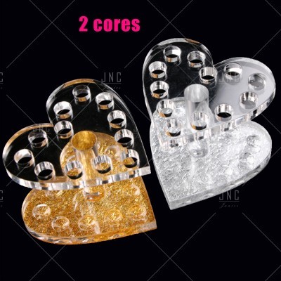 Porta-velas em forma de coração dourado e transparente