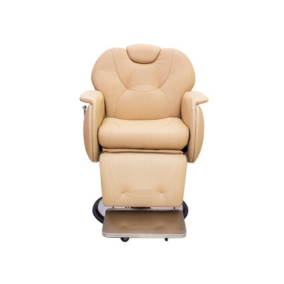 Poltrona de barbeiro bege com apoio de pés metálico