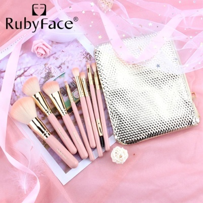 Conjunto de pincéis de maquilhagem rosa com bolsa prateada texturizada