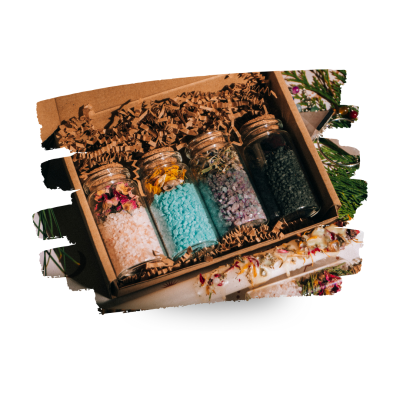 Conjunto de frascos com sais de banho coloridos em caixa de cartão