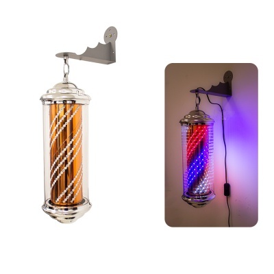 Lanterna de barbeiro cromada com luzes coloridas na parede