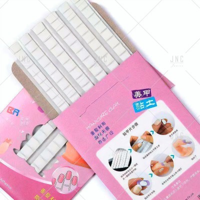 Embalar rosa com lixas de unha brancas e texto em caracteres chineses.