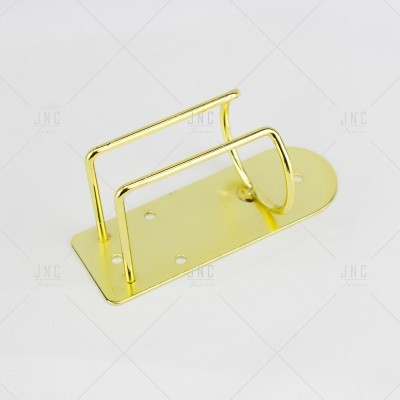 Suporte metálico dourado com base retangular e suportes verticais