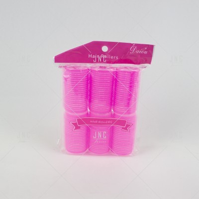 Conjunto de rolos para cabelo cor-de-rosa em embalagem transparente