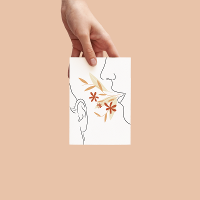 Cartão com desenho minimalista de duas faces humanas e flores