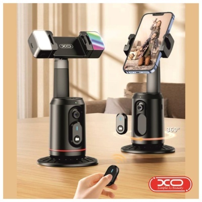 Suporte de telemóvel preto com controle remoto e logotipo XO vermelho