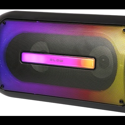 Coluna de som preta com microfone e comando à distância