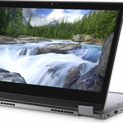 Computador portátil conversível com ecrã tátil exibindo imagem de cascata e floresta