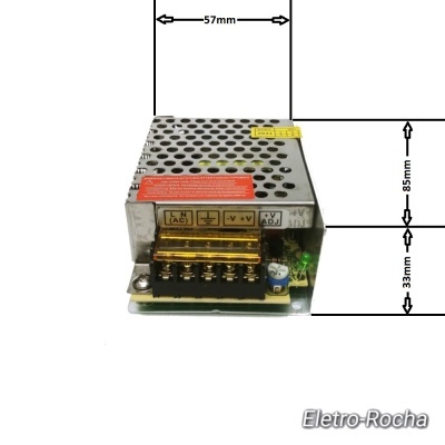 Fonte de alimentação metálica com terminais e etiquetas amarelas e vermelhas