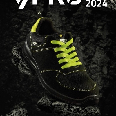 Catálogo YPRO 2023-2024 com sapato de segurança preto e amarelo sobre fundo de pedra escura.