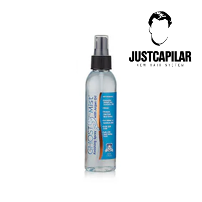 Frasco spray para cabelo transparente com rótulo azul e logótipo JUSTCAPILAR