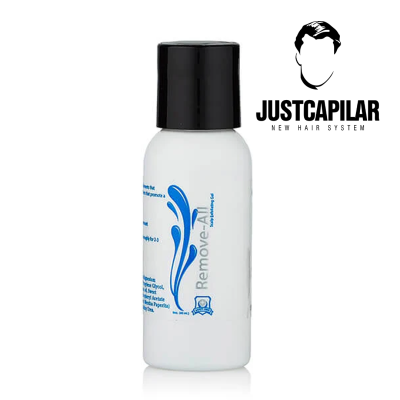 Frasco branco com tampa preta e rótulo azul de produto Remove-All ao lado do logótipo JUSTCAPILAR