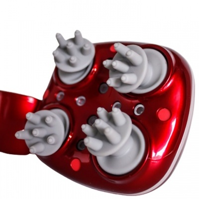 Aparelho elétrico vermelho metálico com quatro cabeças de massagem brancas