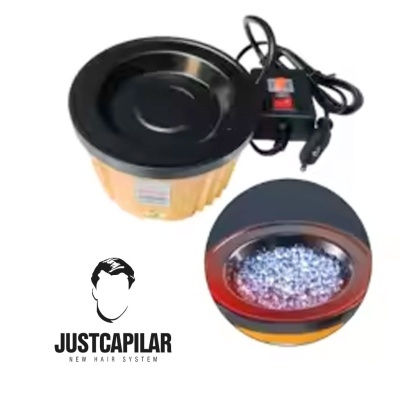 Dispositivo elétrico redondo amarelo com tampa preta e cristais brilhantes no interior