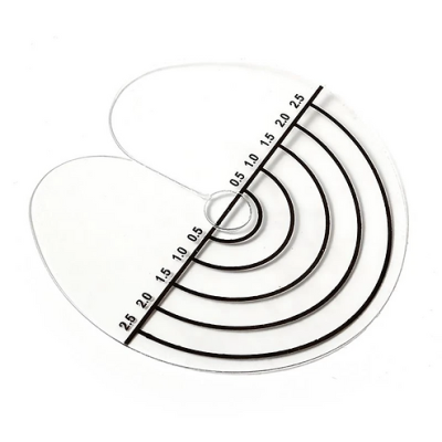 Prancha de riscar para desenho com marcações em círculos concêntricos