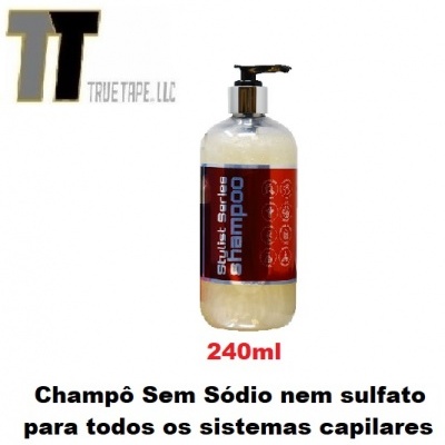 Frasco de champô transparente com tampa preta e rótulo vermelho
